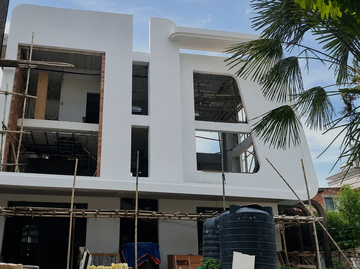 Modern Residence with Acrylic Sheet Exterior Cladding