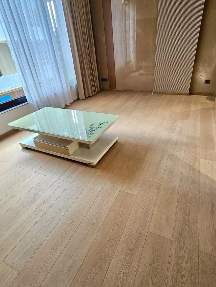 Luxury Living Room with Light Oak Parquetting and Sheer Curtains